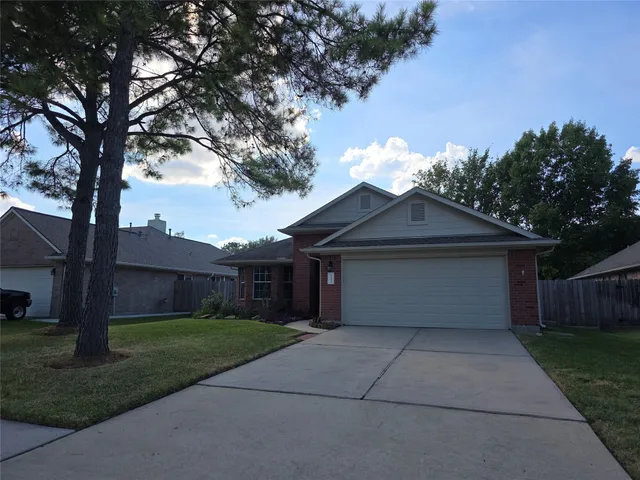 a house view with a garden space
