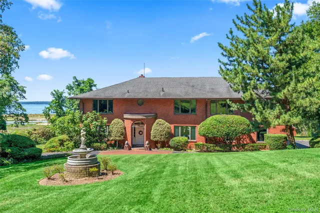 a front view of house with garden