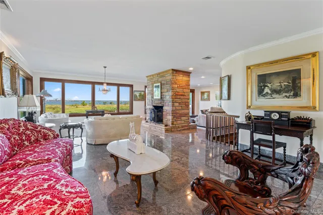 a living room with furniture and a table