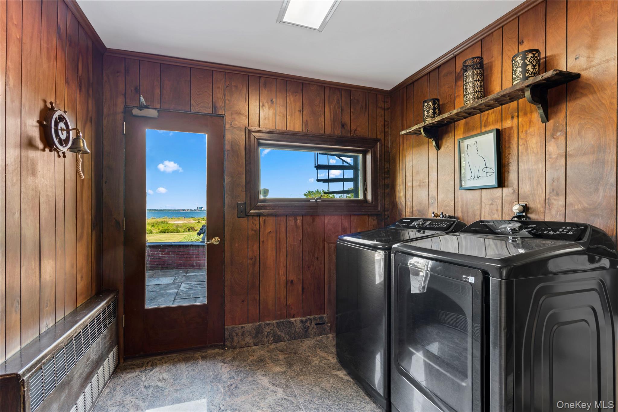 22 Messenger Lane Sands Point, NY 11050 - Photo 19 of 49 a kitchen with stainless steel appliances granite countertop a stove a sink and a refrigerator