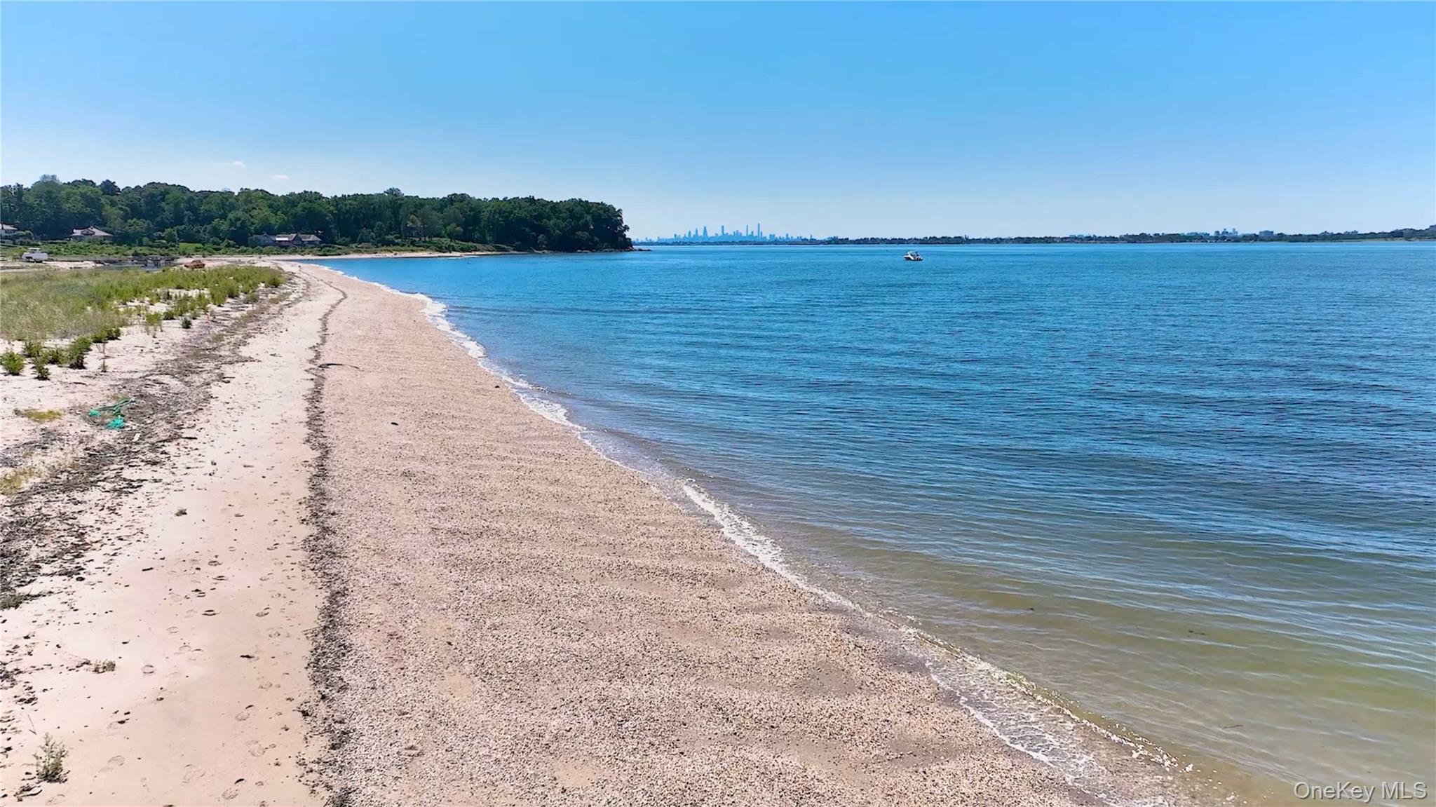 22 Messenger Lane Sands Point, NY 11050 - Photo 2 of 11 a view of lake with mountain