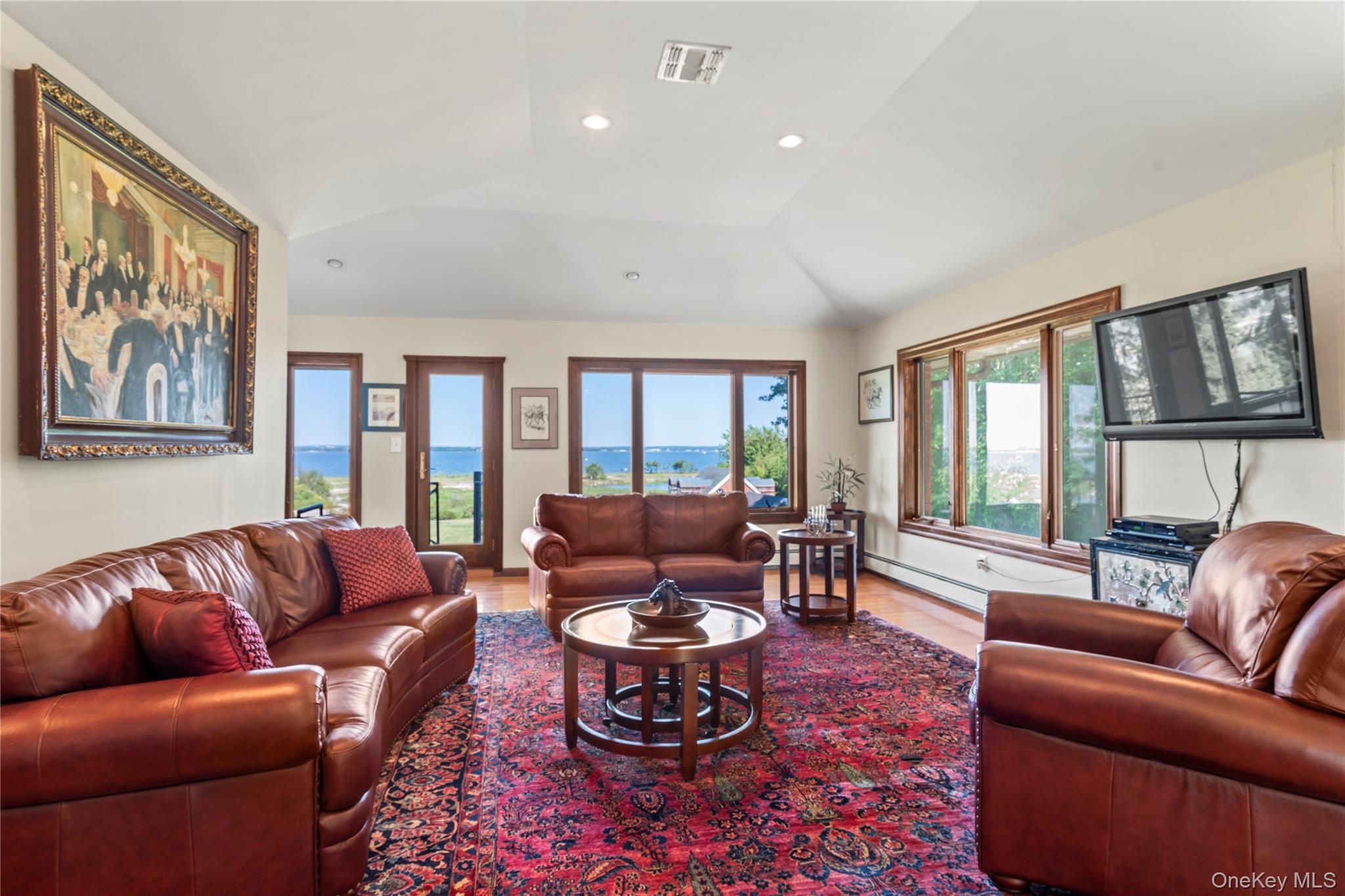 22 Messenger Lane Sands Point, NY 11050 - Photo 26 of 49 a living room with furniture ceiling fan and a window