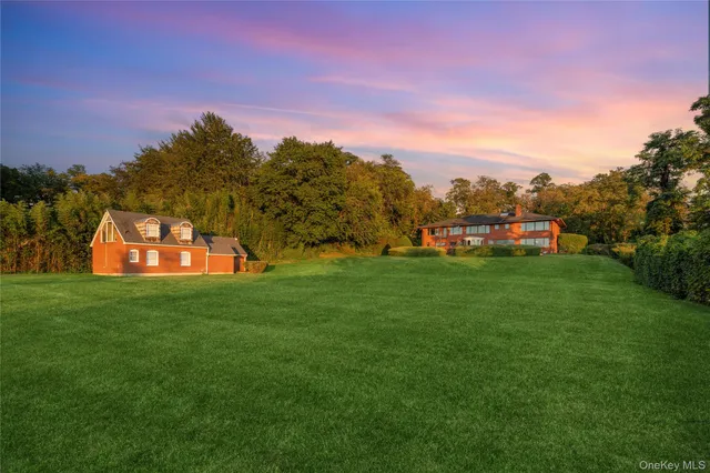 a view of a park with large trees