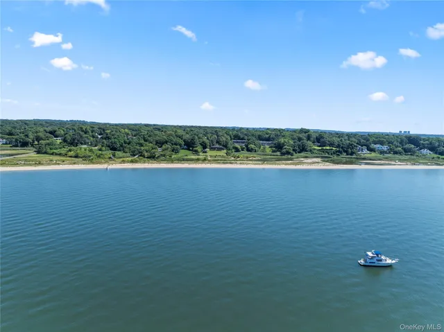 a picture of a room with a white wall and door