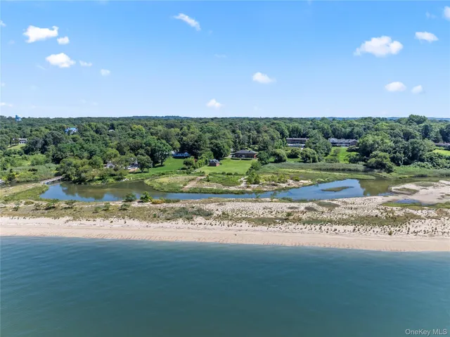 a view of a yard with a table and chair