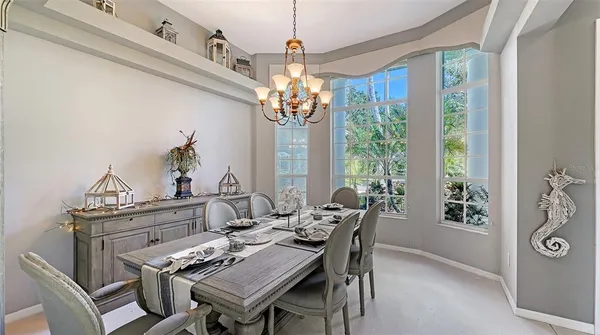 a large kitchen with granite countertop lots of counter space and window