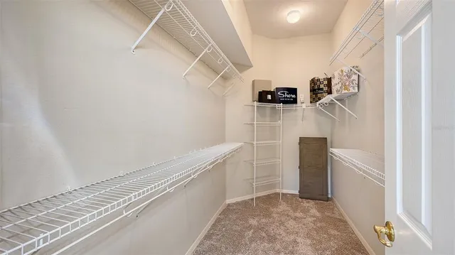 a view of a house with backyard sitting area and porch