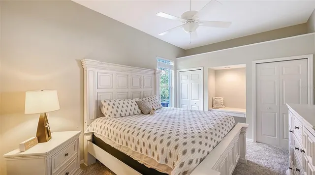 a view of a backyard with plants and patio