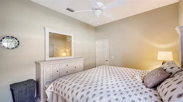 a kitchen with a stove a sink a dining table and chairs