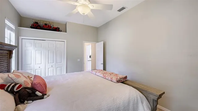 a view of a swimming pool with a yard