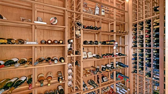 a view of a lake with houses in the back