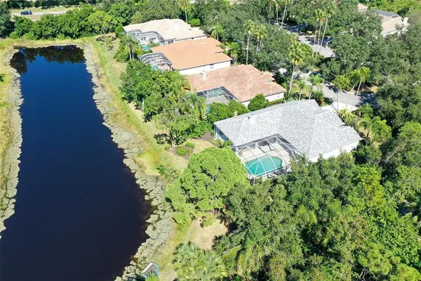 a view of a lake with a big yard