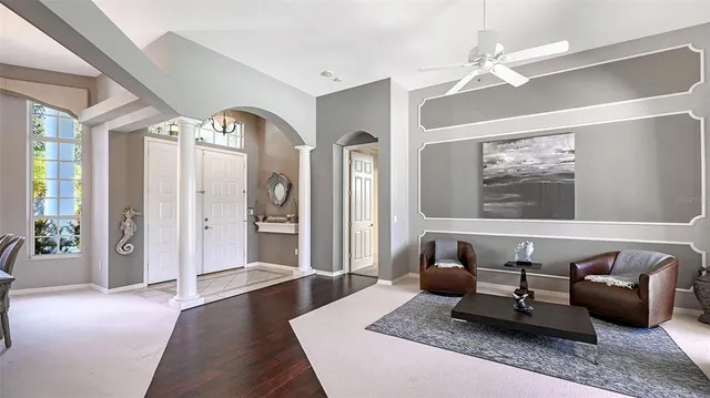 a view of a dining room with furniture window and outside view