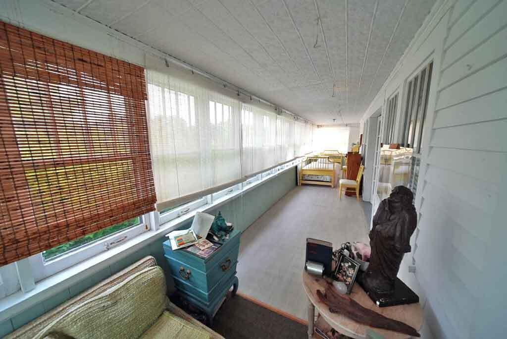 95 Sunset Park Road Orient, ME 04471 - Photo 28 of 66 sun-porch-wrap-around