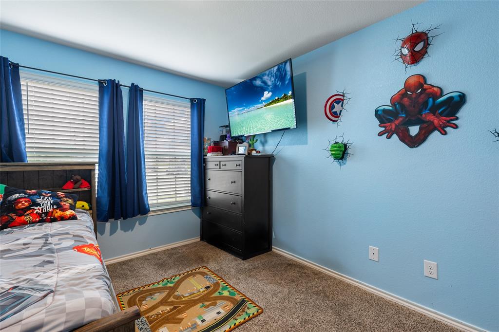 173 Seabiscuit Road Caddo Mills, TX 75135 - Photo 21 of 40 a room with toys and a window