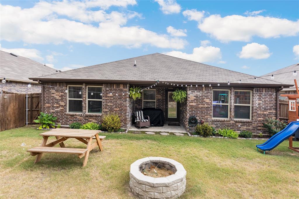 173 Seabiscuit Road Caddo Mills, TX 75135 - Photo 29 of 40 a view of a house with swimming pool and a yard