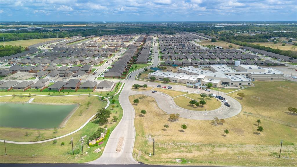 173 Seabiscuit Road Caddo Mills, TX 75135 - Photo 32 of 40 a view of a swimming pool with a yard