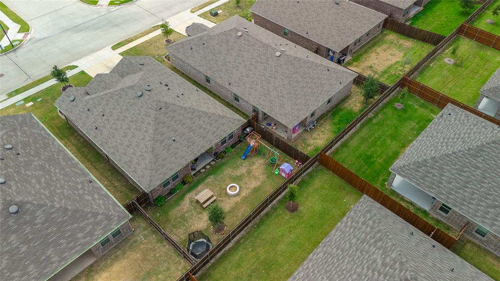 173 Seabiscuit Road Caddo Mills, TX 75135 - Photo 34 of 40 an aerial view of a house with a garden and sitting area