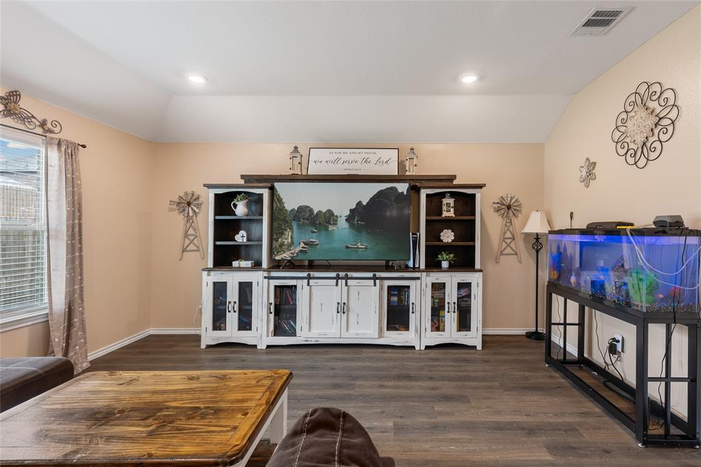 173 Seabiscuit Road Caddo Mills, TX 75135 - Photo 7 of 40 a view of a living room and kitchen