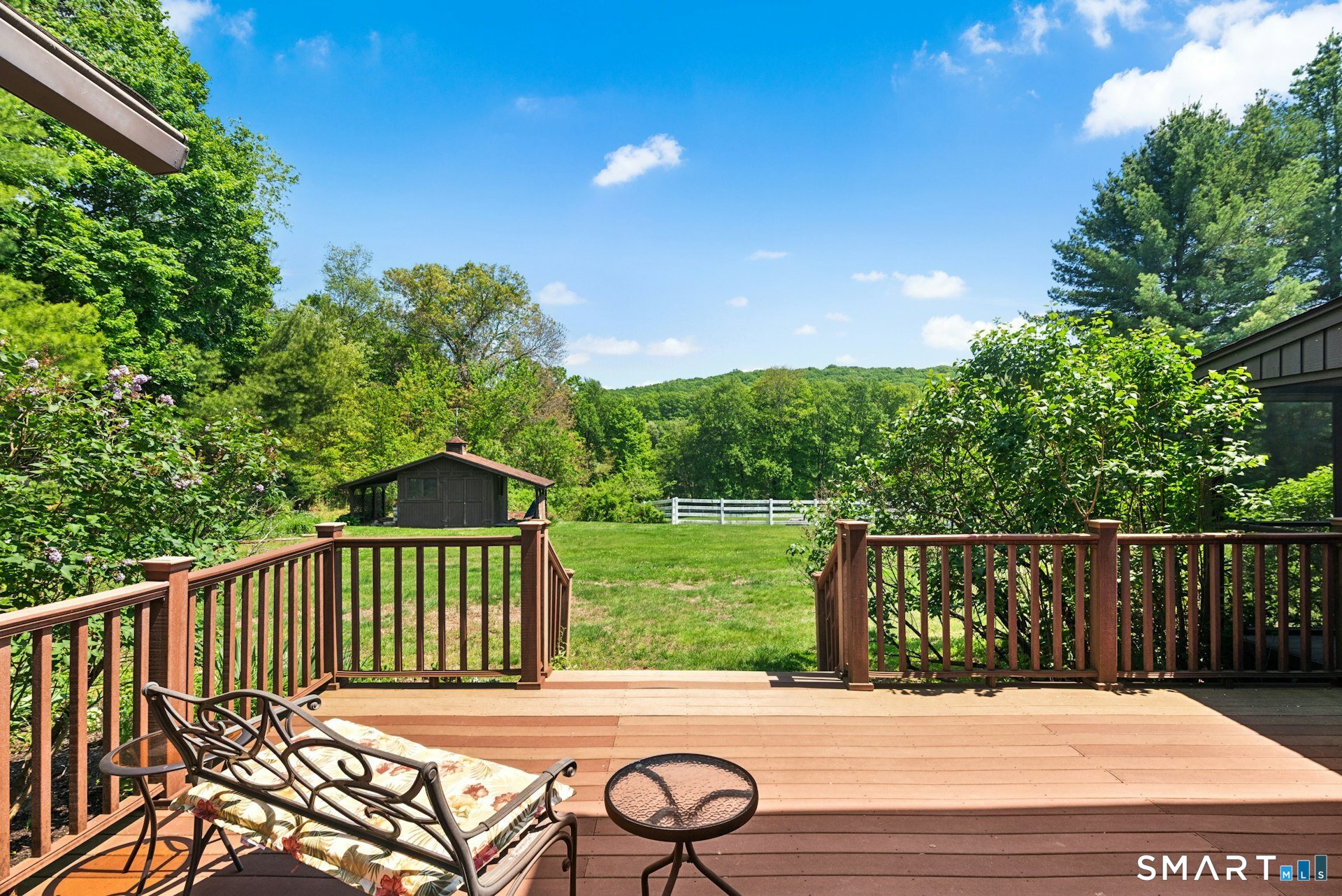 127 Huntingtown Road Newtown, CT 06470 - Photo 24 of 38 a deck view with a garden