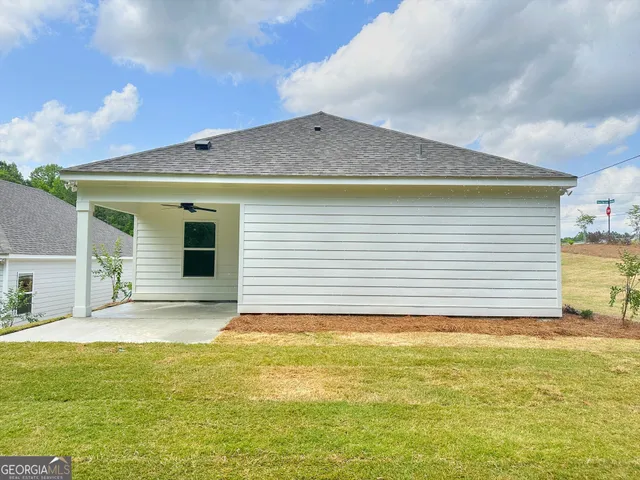 a house view with a garden space