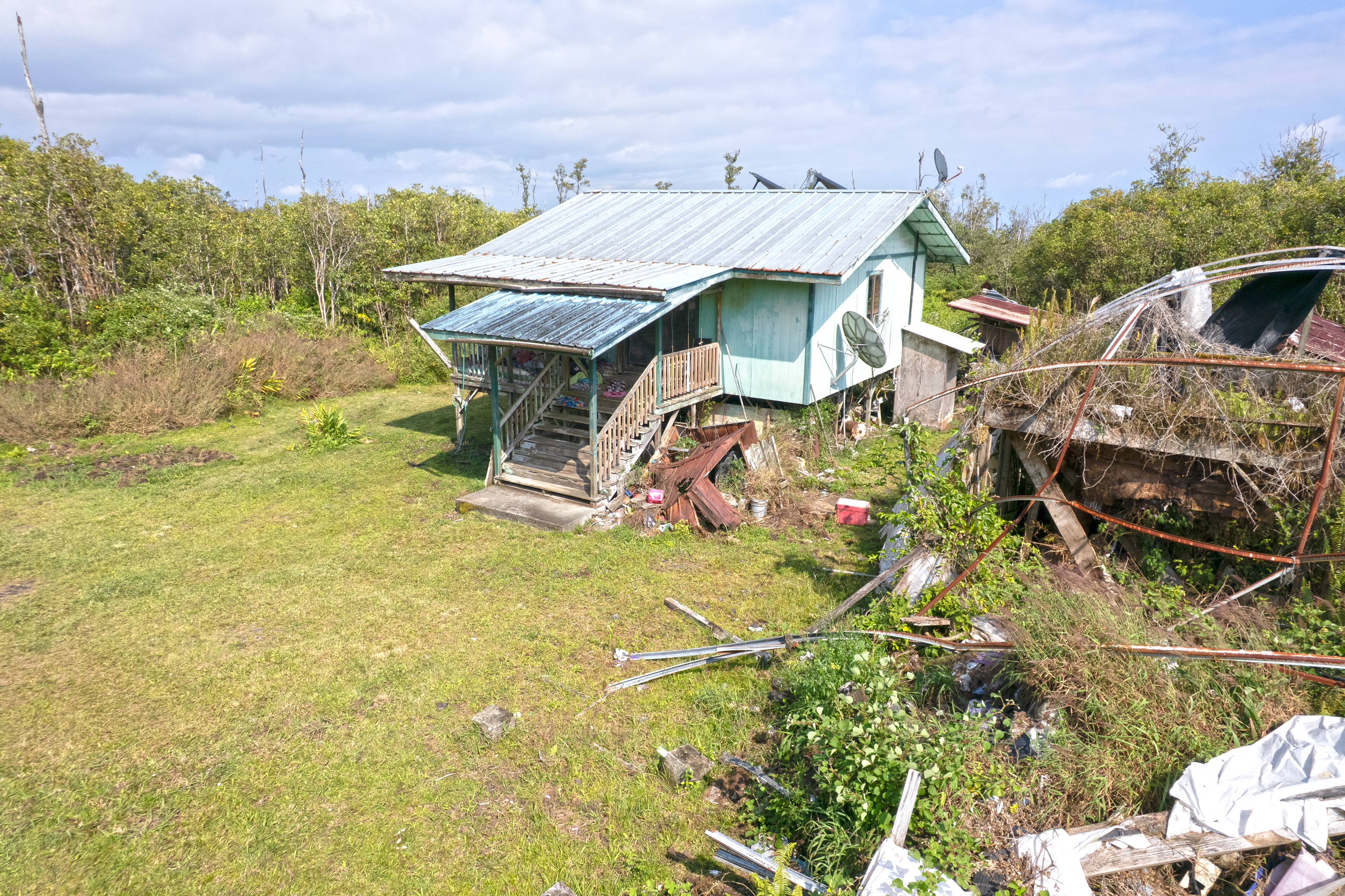 11-2217 Kaleponi Road Mountain View, HI 96771 - Photo 11 of 13 a view of a house with a yard