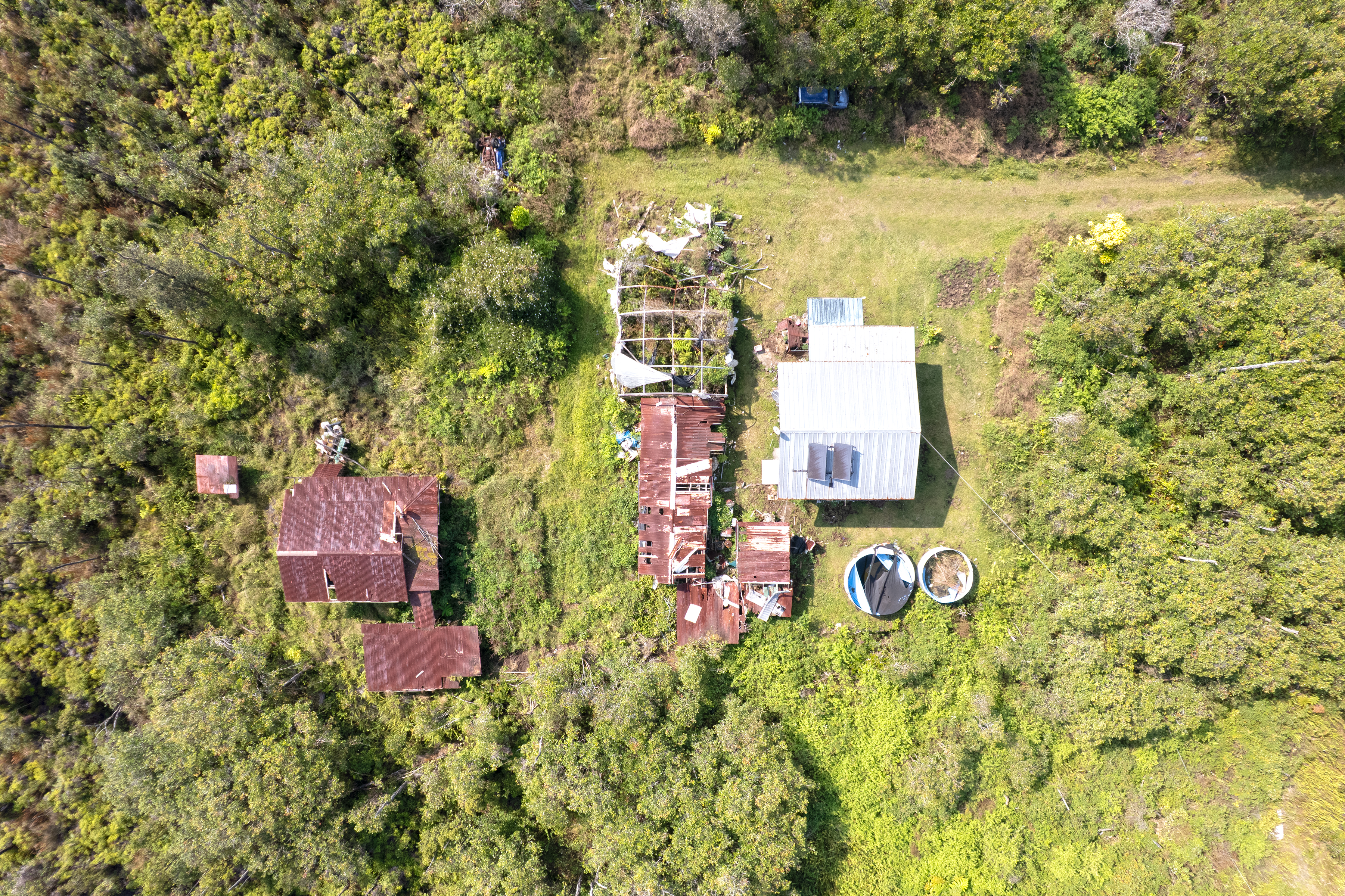 11-2217 Kaleponi Road Mountain View, HI 96771 - Photo 4 of 13 a view of building with yard