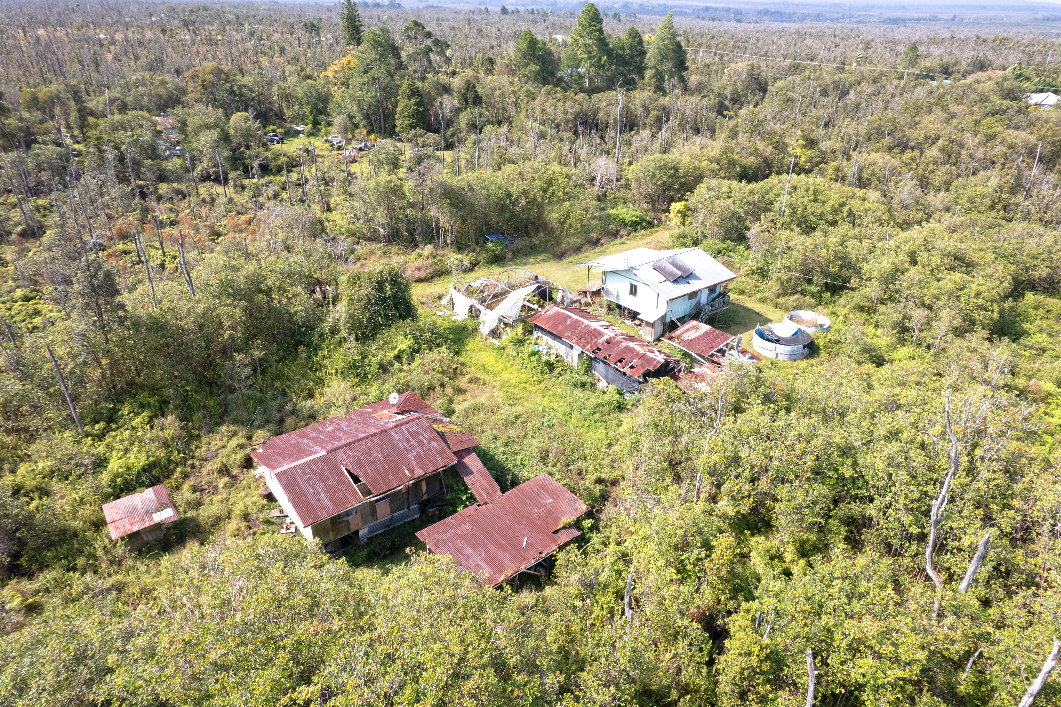 11-2217 Kaleponi Road Mountain View, HI 96771 - Photo 7 of 13 an aerial view of residential houses with outdoor space