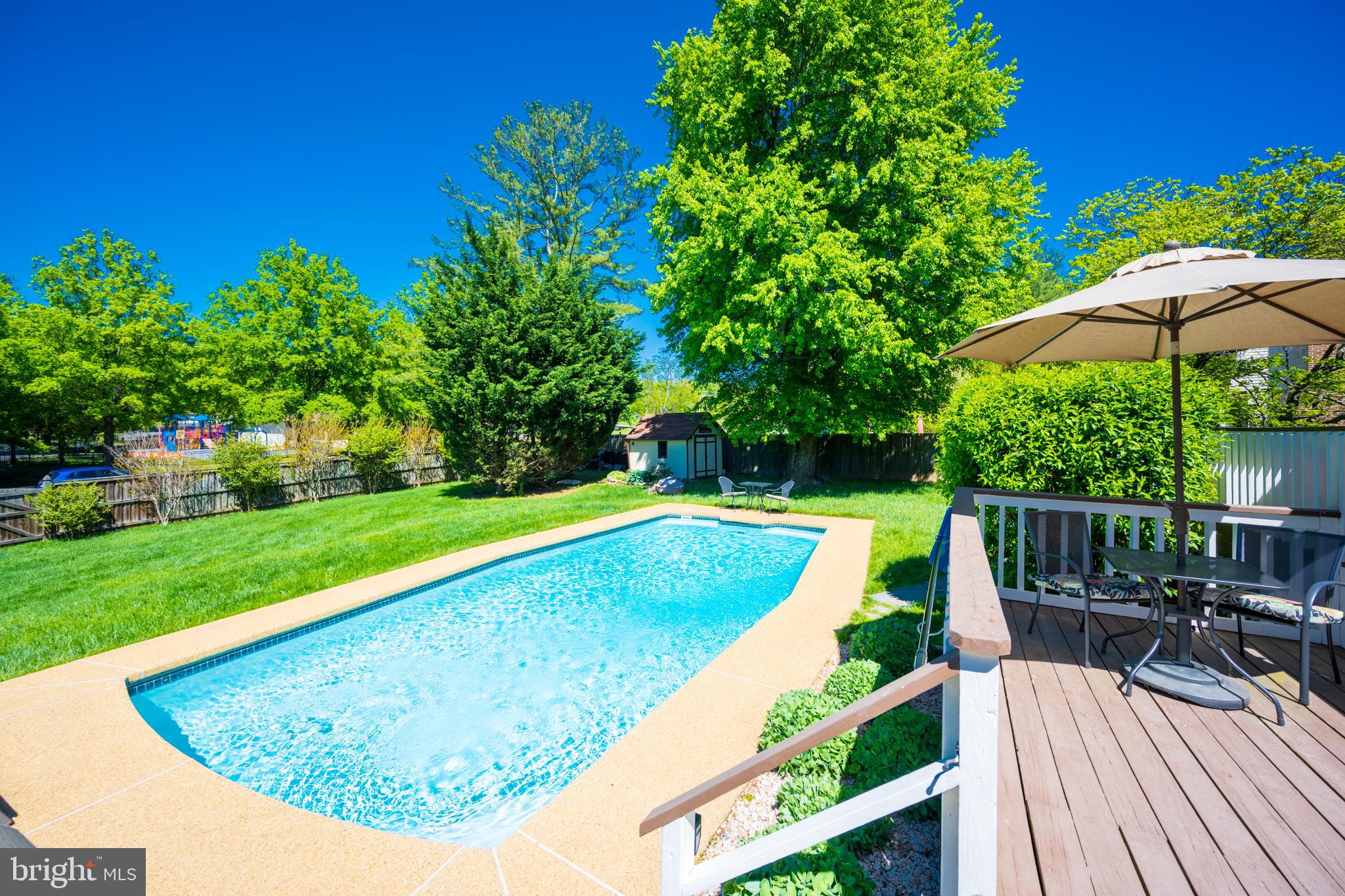12421 Wendell Holmes Road Oak Hill, VA 20171 - Photo 14 of 56 In-ground pool and deck view from deck