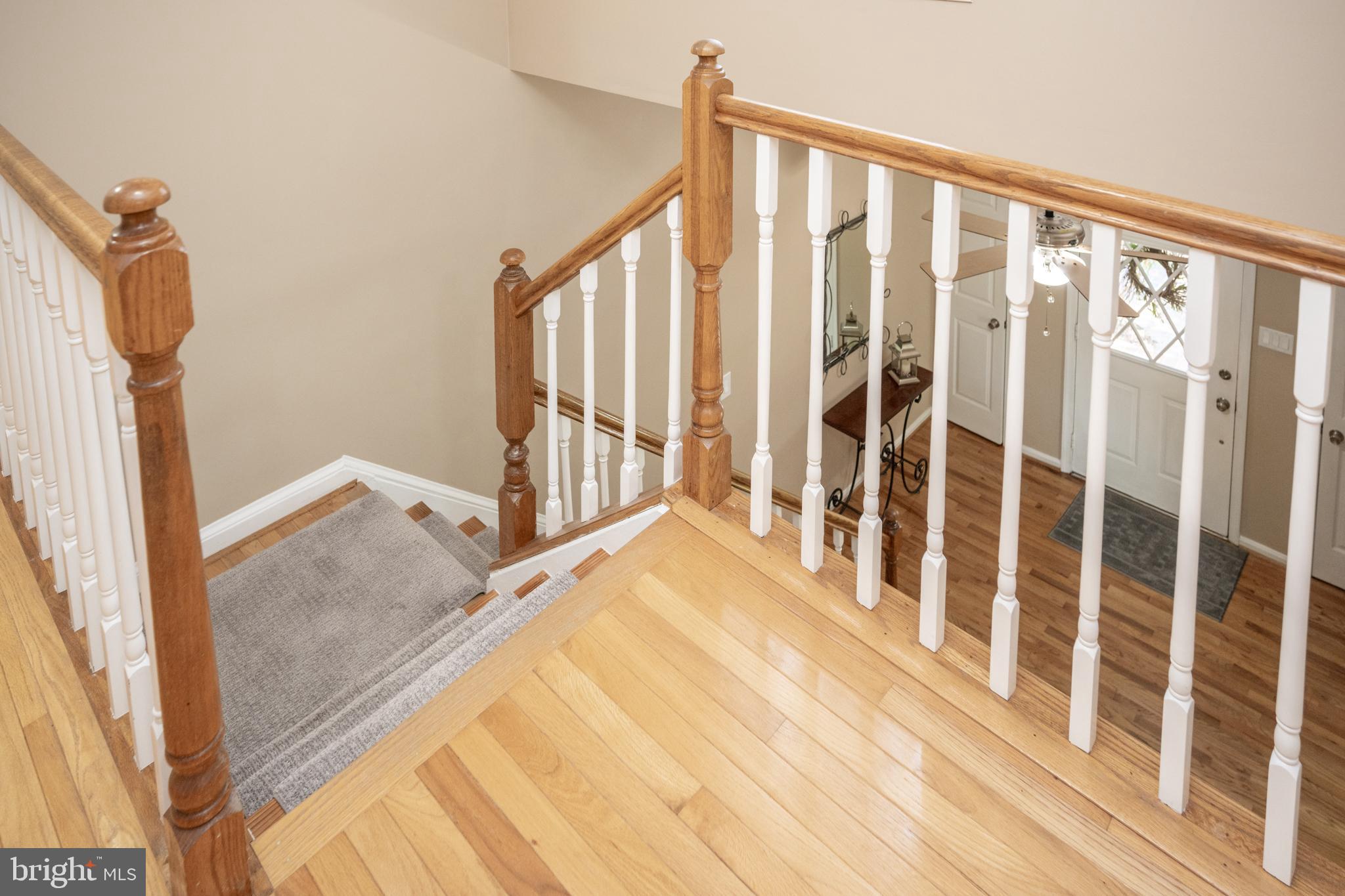 12421 Wendell Holmes Road Oak Hill, VA 20171 - Photo 35 of 56 Second level hall view to the entry foyer