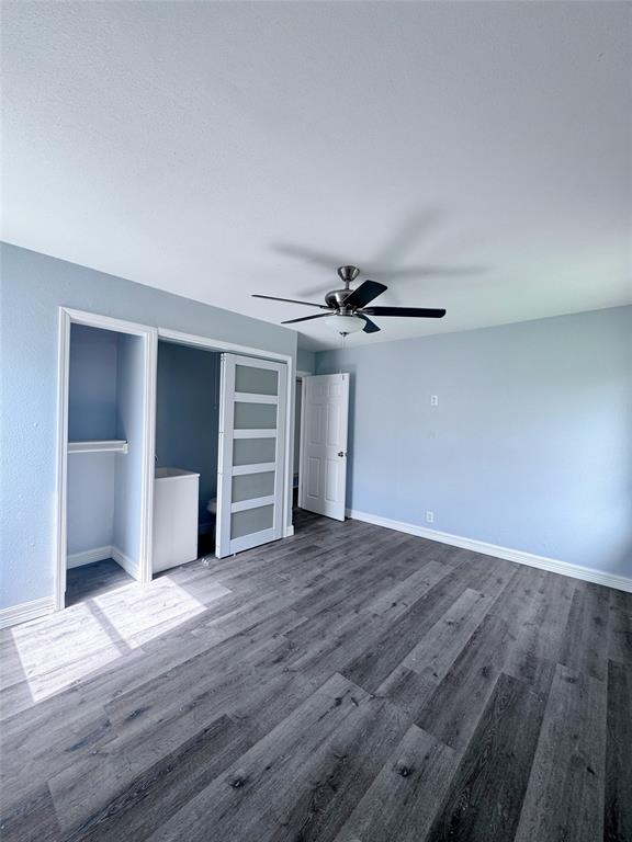 345 16th Street Southwest Paris, TX 75460 - Photo 8 of 15 a view of empty room with wooden floor