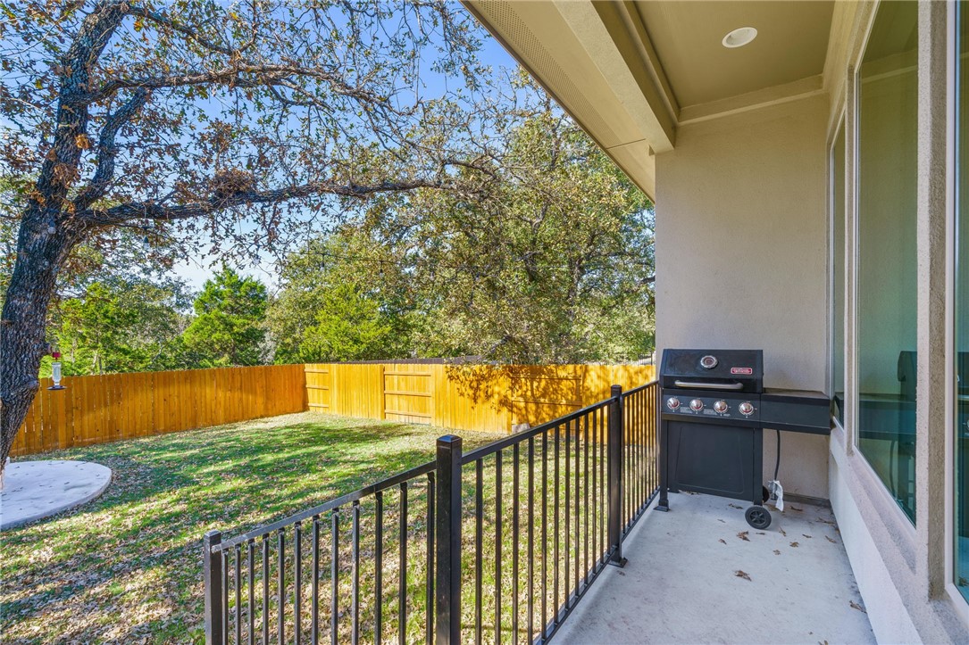 941 Del Raphael Drive Leander, TX 78641 - Photo 23 of 33 Step right outside to a covered patio that acts like a second living room during the spring and fall