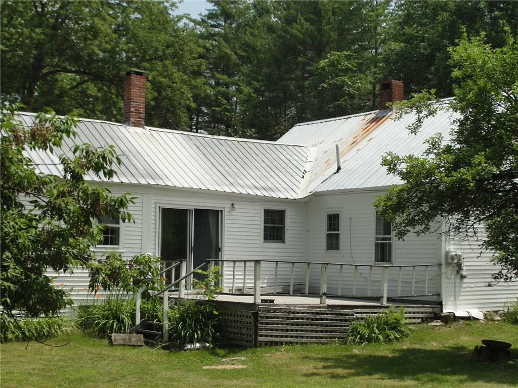 57 Harmon Road Bridgton, ME 04009 - Photo 7 of 28 Back side of house with deck off...