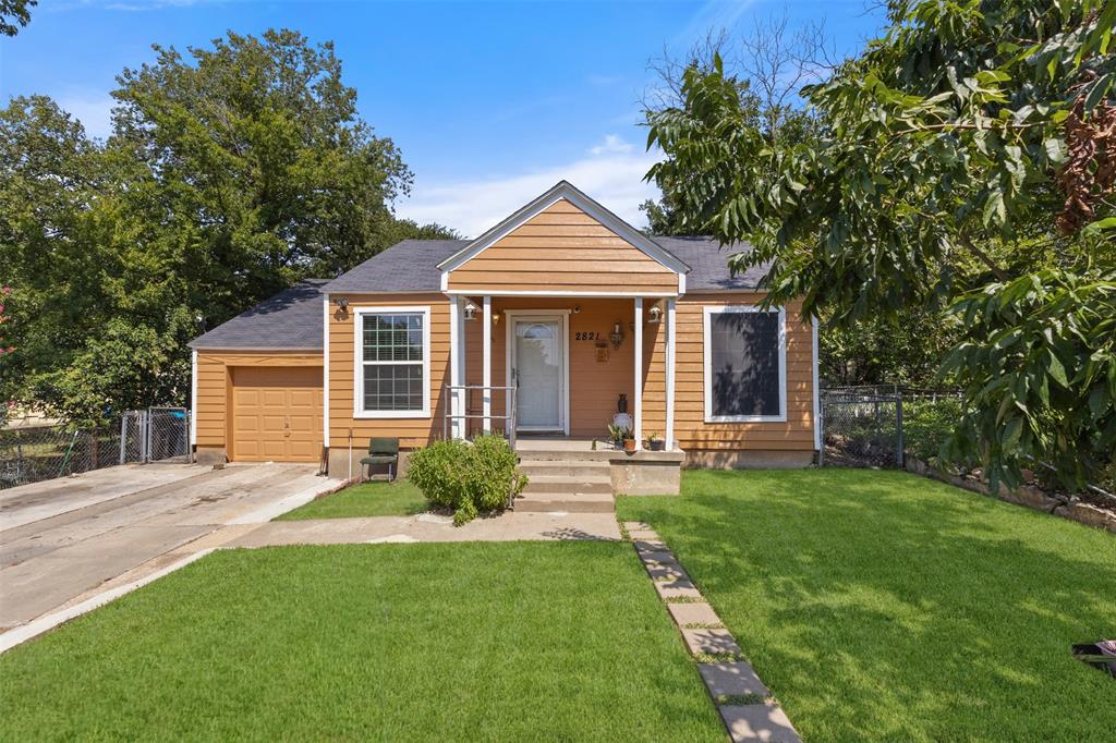 Bungalow-style home featuring driveway, covered porch, a shingled roof, and an attached garage