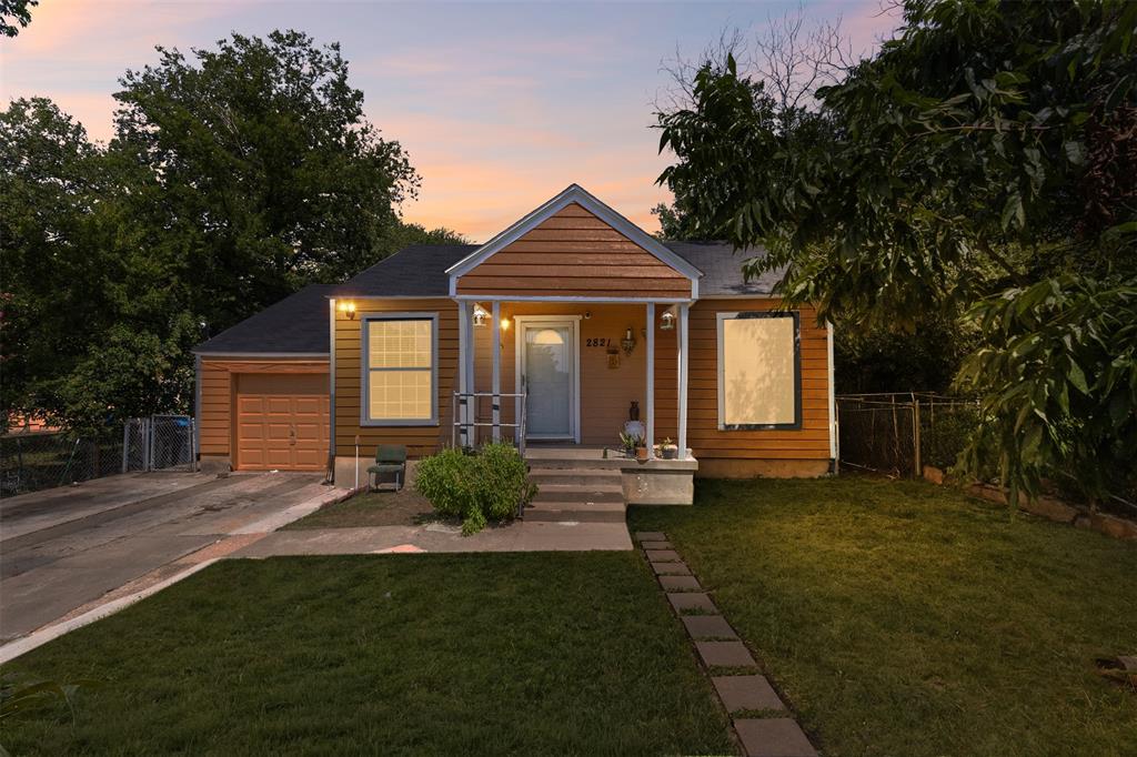 2821 Burchill Road South Fort Worth, TX 76105 - Photo 2 of 33 View of front of house with driveway, a porch, an attached garage, and a shingled roof