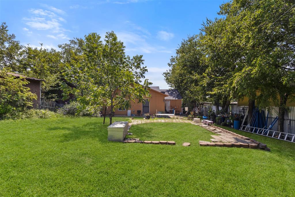 2821 Burchill Road South Fort Worth, TX 76105 - Photo 25 of 33 View of yard with a patio area