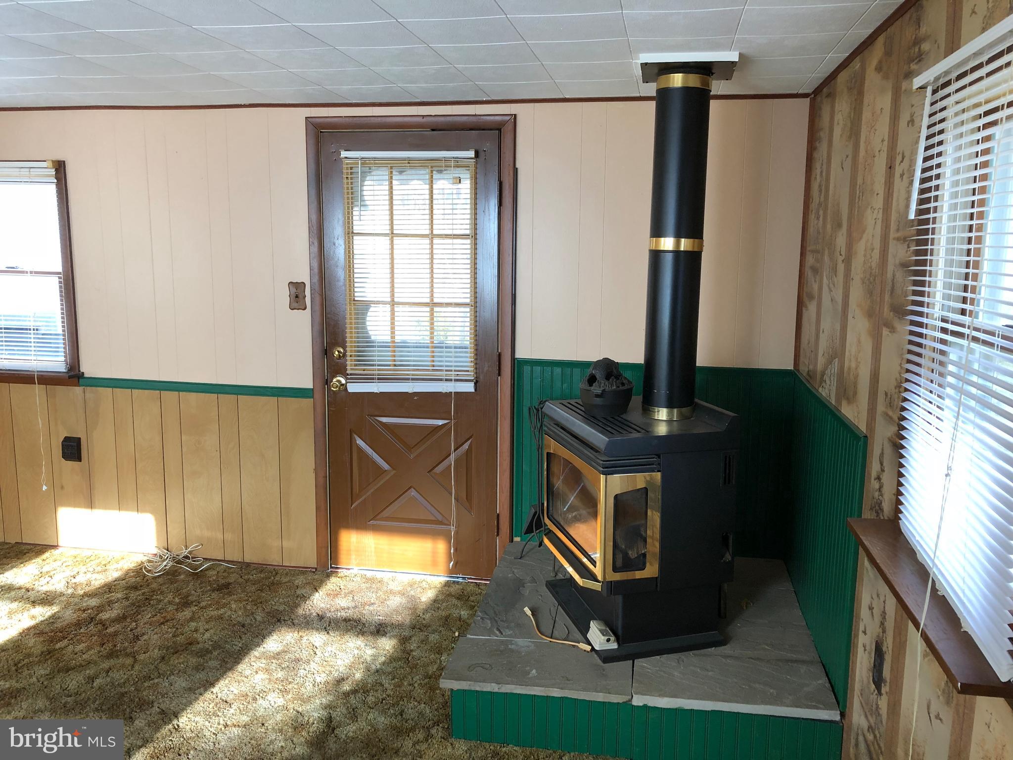 405 Summit Avenue Reading, PA 19607 - Photo 5 of 13 WOOD STOVE IN THE FAMILY ROOM