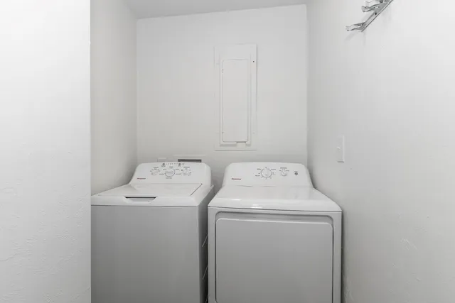 a utility room with dryer and washer