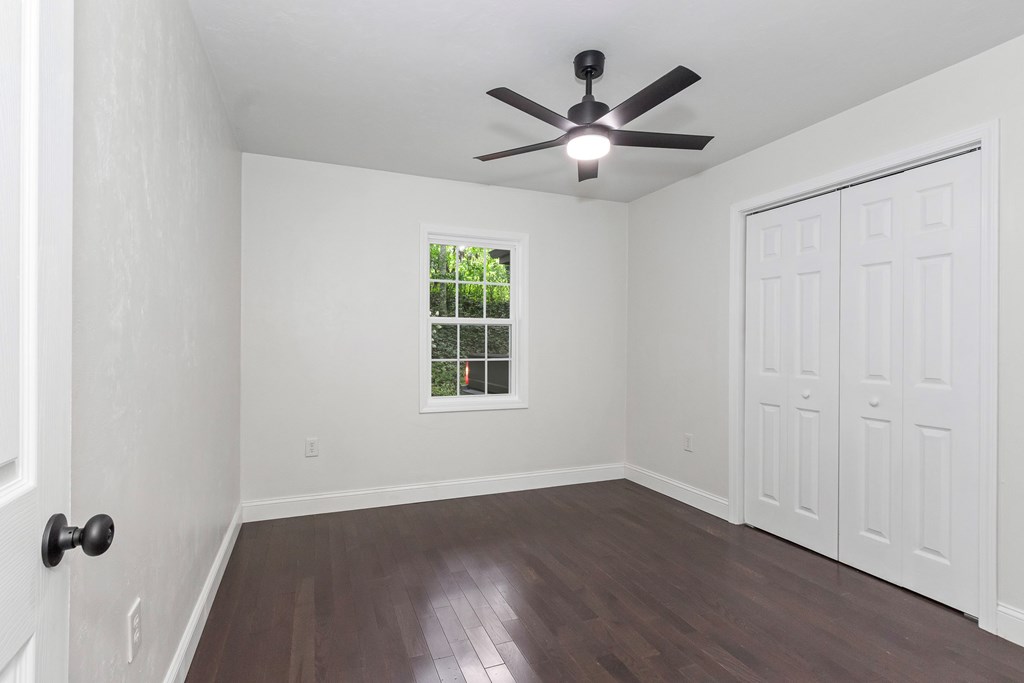 123 Quarry Road Andrews, NC 28901 - Photo 25 of 51 wooden floor in an empty room with a window