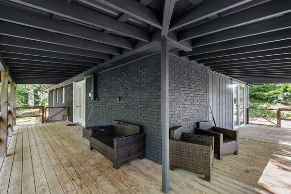 a view of a porch with furniture