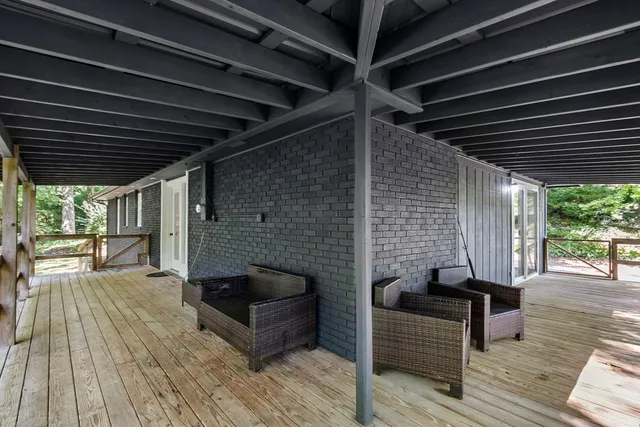 a view of a porch with furniture