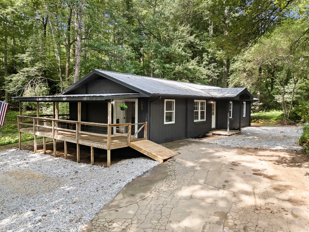 123 Quarry Road Andrews, NC 28901 - Photo 44 of 51 a house with trees in the background