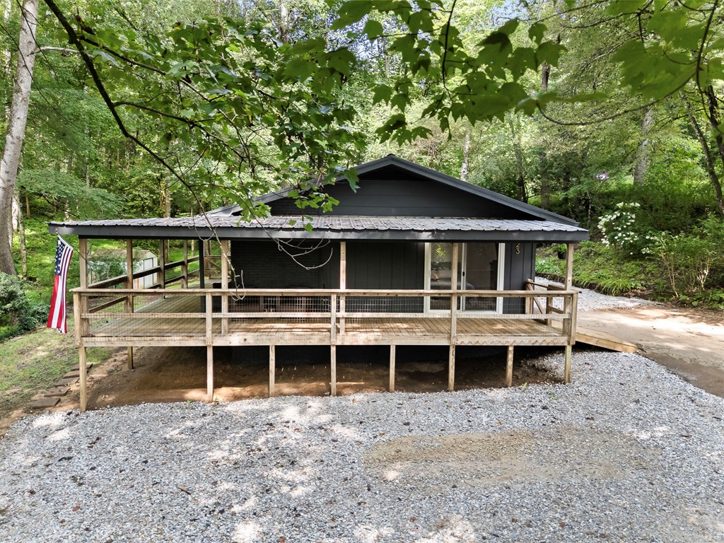 123 Quarry Road Andrews, NC 28901 - Photo 45 of 51 a house with trees in the background