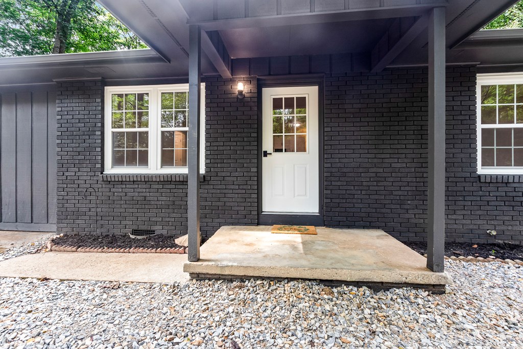 123 Quarry Road Andrews, NC 28901 - Photo 5 of 51 a view of a brick house with a yard