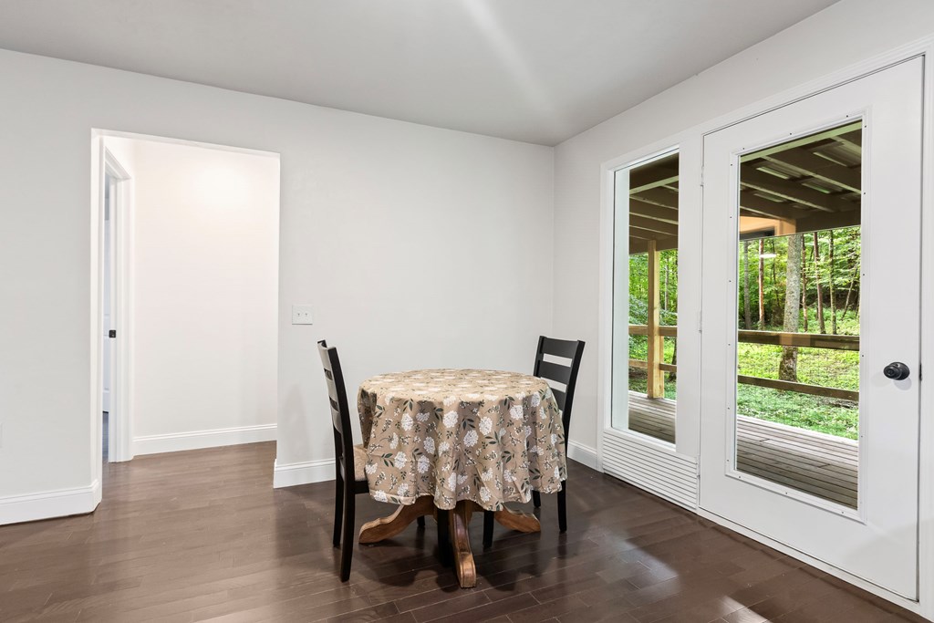 123 Quarry Road Andrews, NC 28901 - Photo 10 of 51 a view of a dining room with furniture and windows