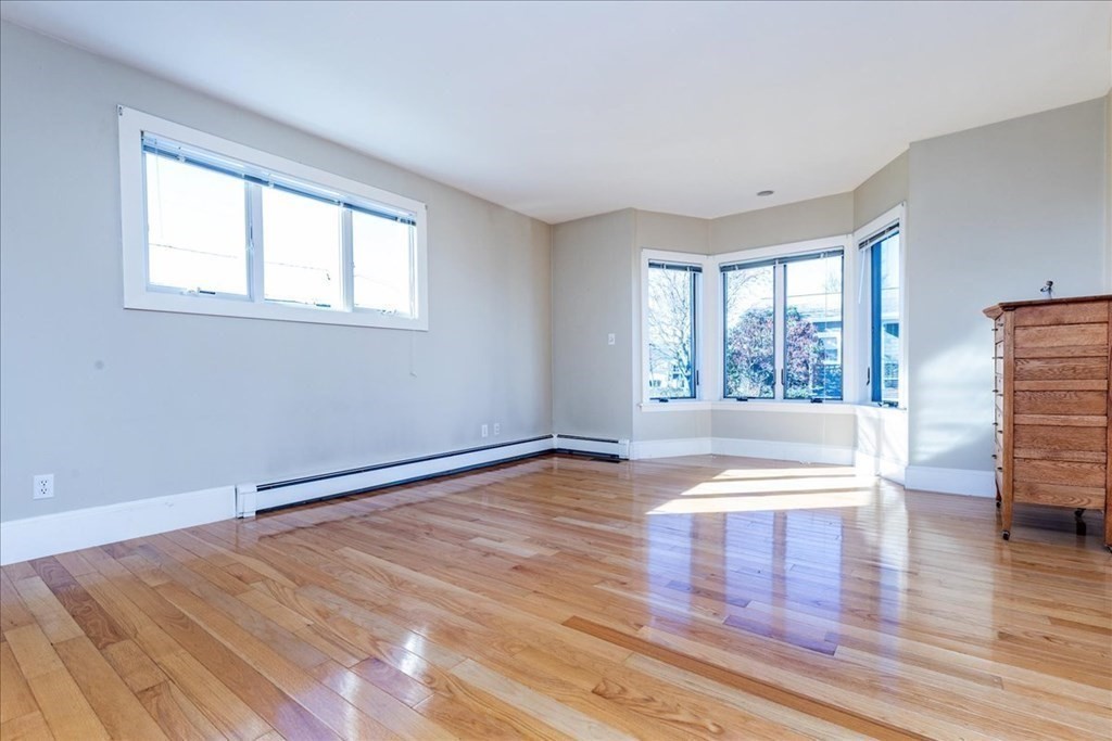 106 North Ridge Road Ipswich, MA 01938 - Photo 12 of 42 wooden floor in an empty room with a window