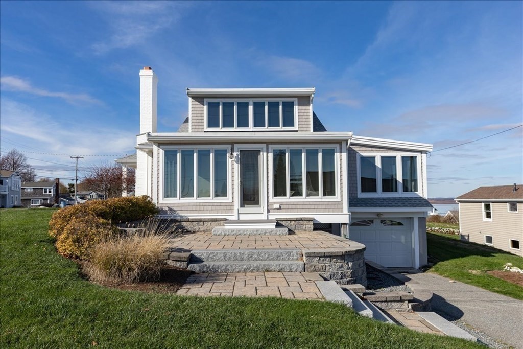 106 North Ridge Road Ipswich, MA 01938 - Photo 3 of 42 a view of a house with backyard sitting area and garden