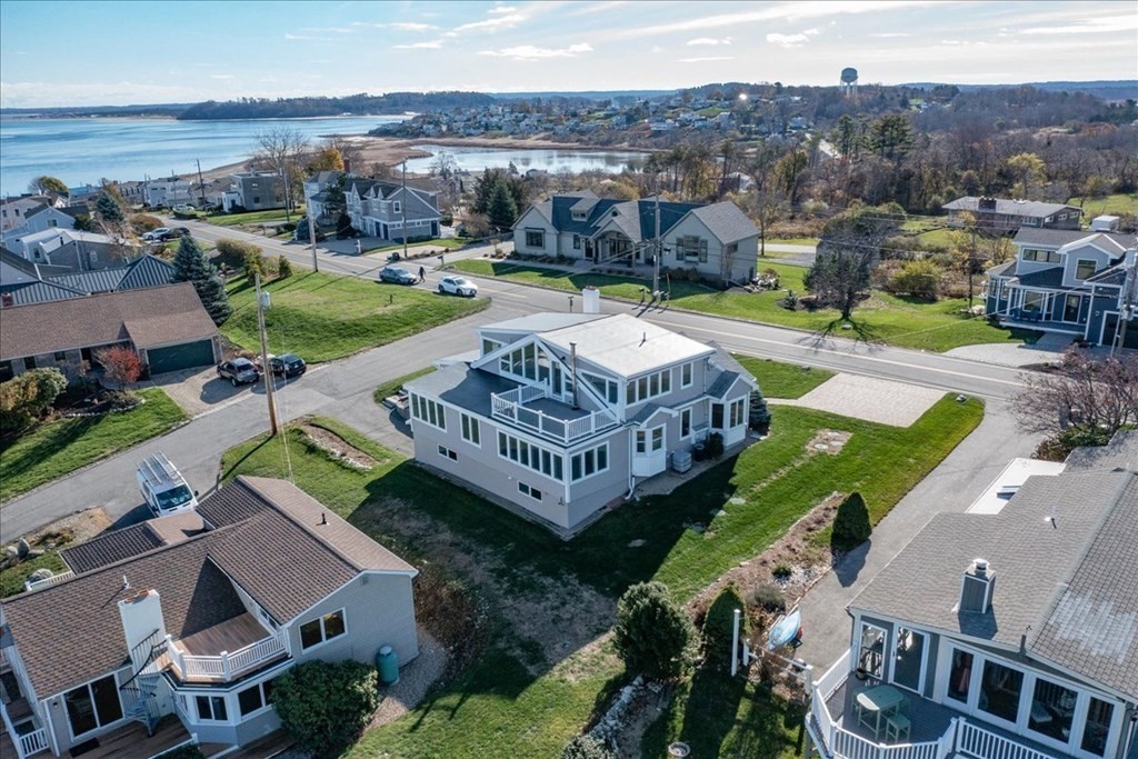 106 North Ridge Road Ipswich, MA 01938 - Photo 42 of 42 an aerial view of a house with swimming pool patio and outdoor seating