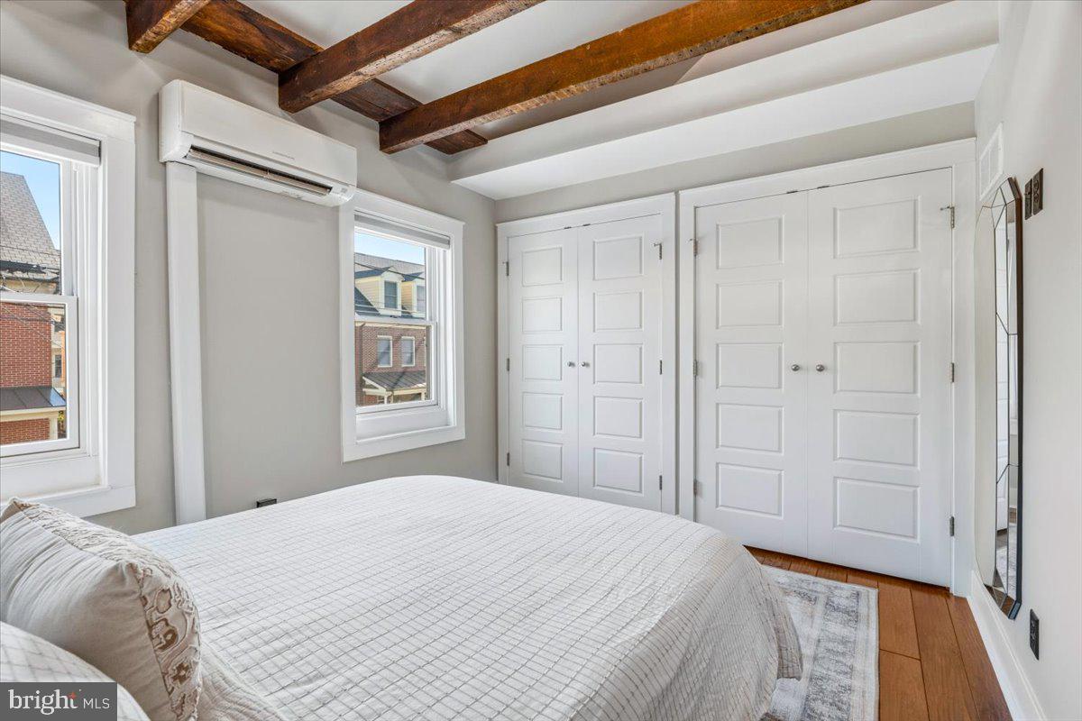 37 East 5th Street Frederick, MD 21701 - Photo 25 of 50 a bedroom with a bed and a window