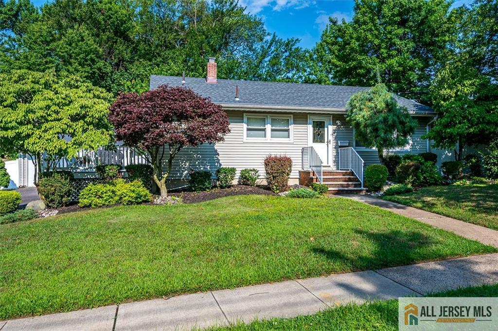 20 Melville Road Edison, NJ 08817 - Photo 1 of 31 a view of a house with a yard
